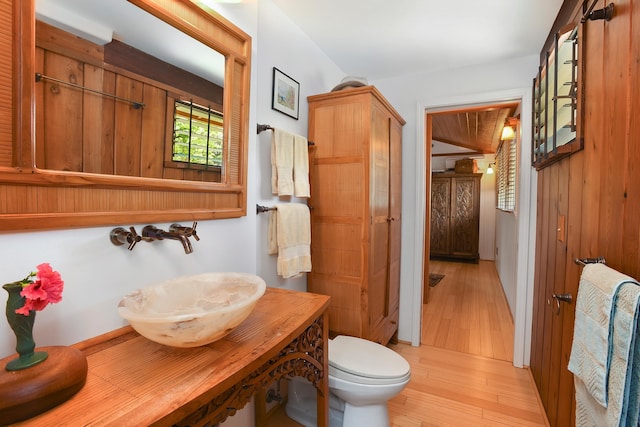 679 Kaapuni Pl, Kihei, HI 96753 - bathroom featuring hardwood / wood-style floors and vanity