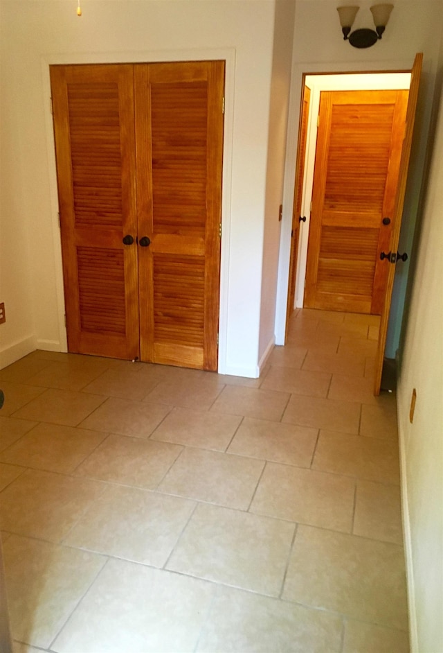 679 Kaapuni Pl, Kihei, HI 96753 - hallway with light tile patterned flooring