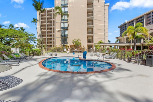 view of pool featuring a patio area