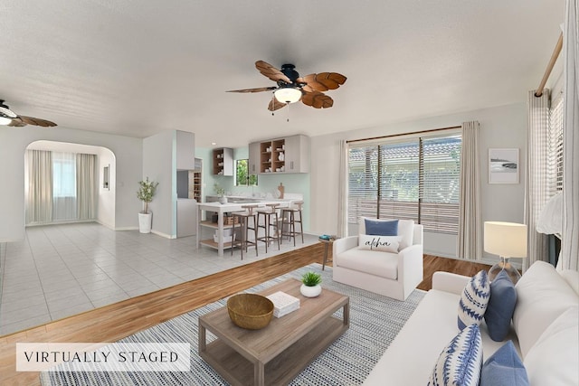 2730 Ohina St, Kihei, HI 96753 - living room with a ceiling fan, baseboards, healthy amount of natural light, and light tile patterned flooring