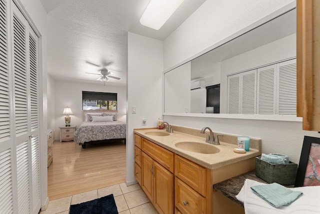 2730 Ohina St, Kihei, HI 96753 - bathroom with a closet, tile patterned floors, double vanity, and ensuite bath
