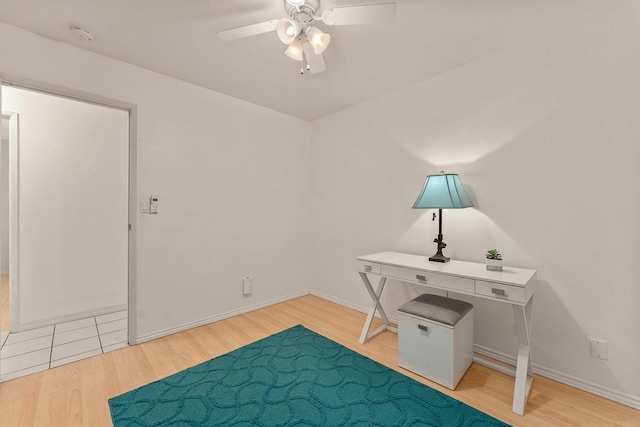 2730 Ohina St, Kihei, HI 96753 - unfurnished office with ceiling fan, wood finished floors, and baseboards