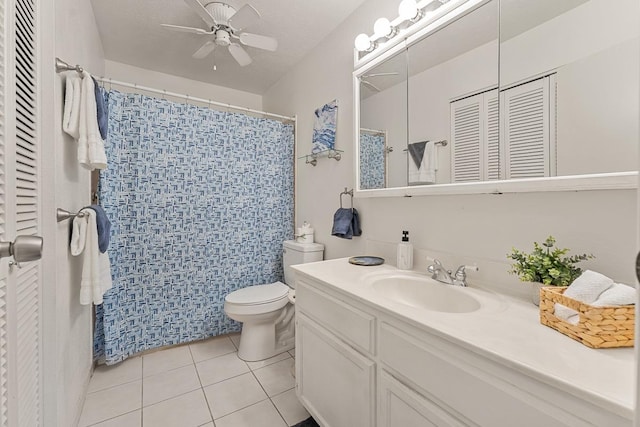 2730 Ohina St, Kihei, HI 96753 - bathroom with tile patterned floors, a closet, toilet, ceiling fan, and vanity