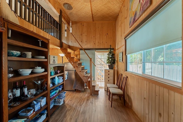 2730 Ohina St, Kihei, HI 96753 - living area featuring wooden walls, wood-type flooring, and stairway