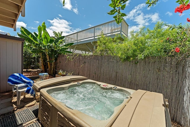 2730 Ohina St, Kihei, HI 96753 - view of patio / terrace featuring a hot tub and fence