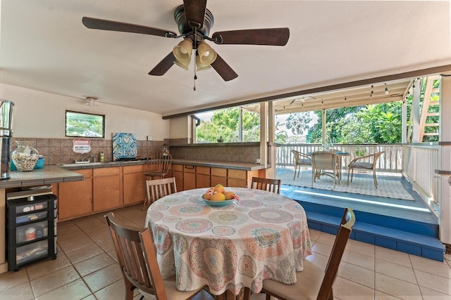 2730 Ohina St, Kihei, HI 96753 - dining room featuring light tile patterned flooring and a ceiling fan
