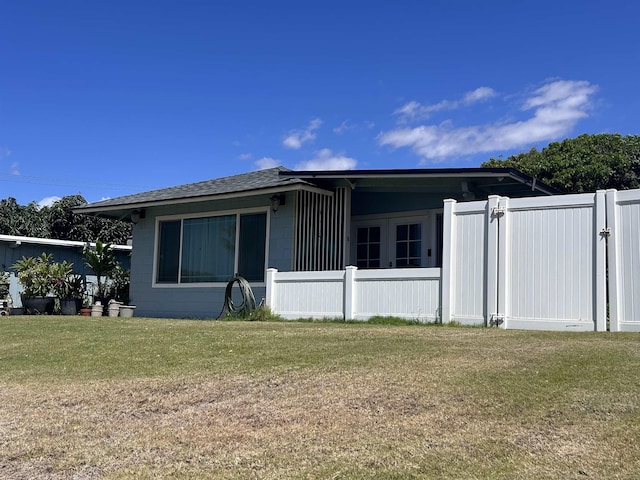 129 Niihau St, Kahului, HI 96732 - view of side of property featuring concrete block siding and a shingled roof