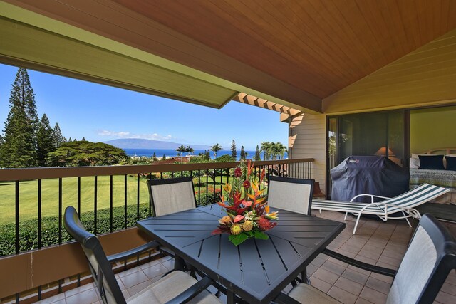 balcony with a mountain view and grilling area