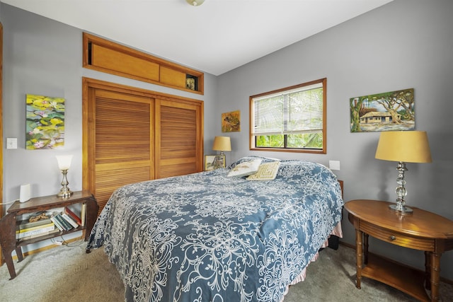 carpeted bedroom with a closet