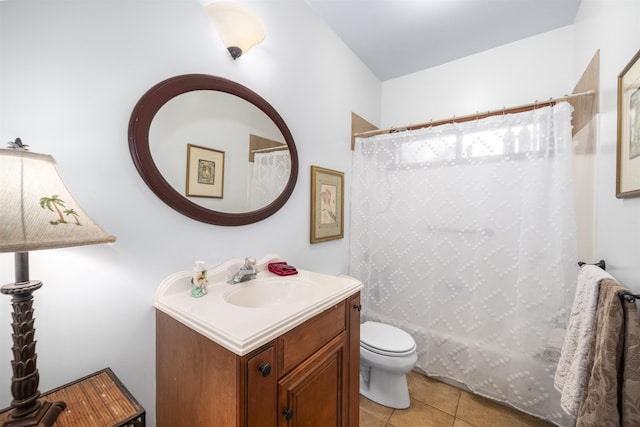 bathroom featuring vanity, curtained shower, tile patterned floors, and toilet