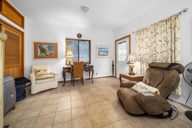 sitting room with light tile patterned floors