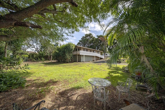 view of yard with a wooden deck