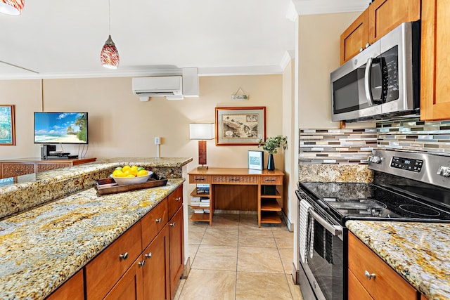 kitchen with a wall unit AC, decorative backsplash, light stone countertops, and stainless steel appliances