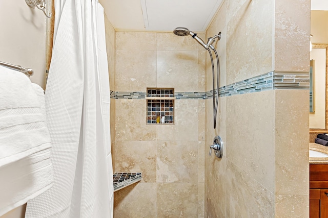 bathroom with vanity and walk in shower