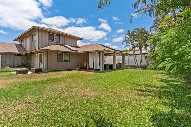 19 Heona Pl, Kihei, HI 96753 - back of house with board and batten siding, a patio area, and roof with shingles