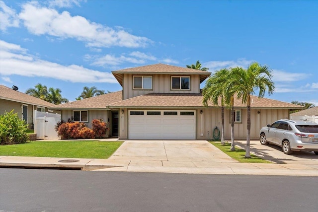 19 Heona Pl, Kihei, HI 96753 - traditional-style home with driveway, board and batten siding, and roof with shingles