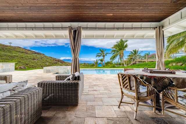 view of terrace featuring a mountain view