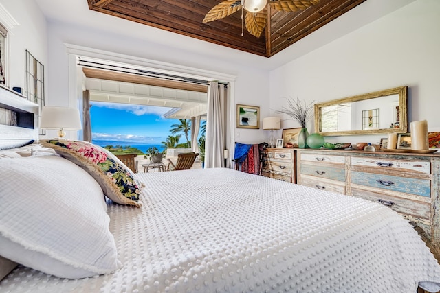 bedroom with ceiling fan, multiple windows, wood ceiling, and access to outside