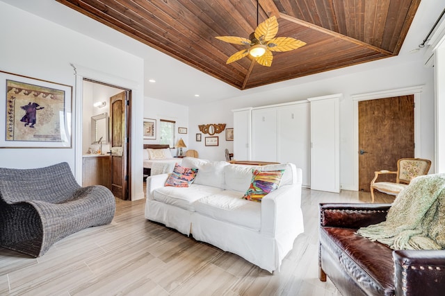 living room with light hardwood / wood-style floors, wooden ceiling, and ceiling fan