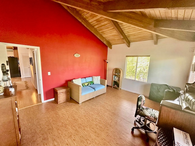 living room with vaulted ceiling with beams, hardwood / wood-style floors, and wood ceiling