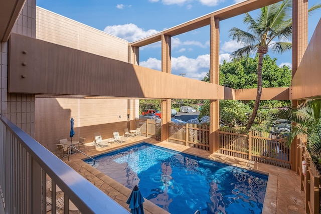 view of pool featuring a patio area