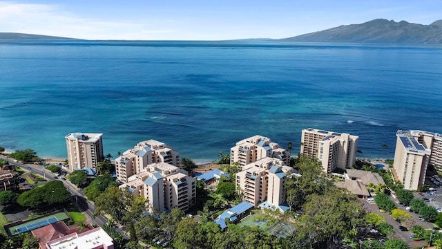 aerial view featuring a water and mountain view