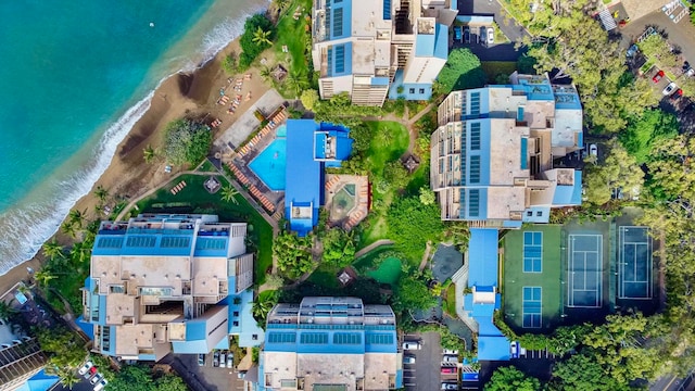 aerial view featuring a water view and a beach view