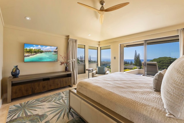 carpeted bedroom with access to exterior and ceiling fan