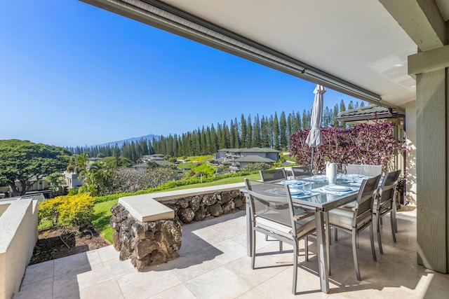 view of patio / terrace with a mountain view