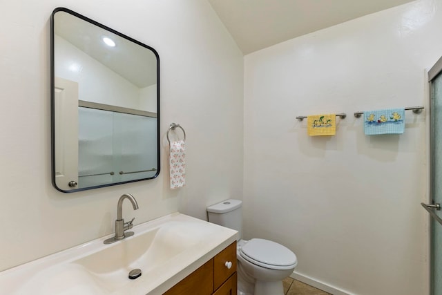 534 Kaikoo Pl, Wailuku, HI 96793 - bathroom featuring vanity, toilet, tile patterned flooring, and lofted ceiling
