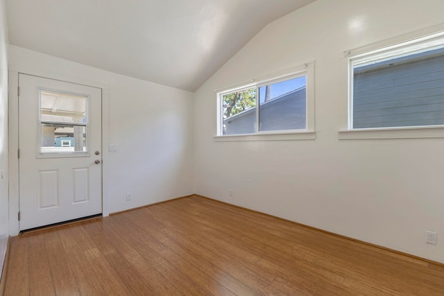 534 Kaikoo Pl, Wailuku, HI 96793 - empty room with wood finished floors and lofted ceiling