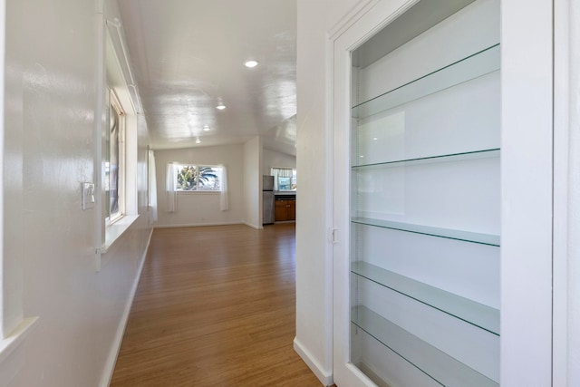 534 Kaikoo Pl, Wailuku, HI 96793 - corridor featuring baseboards, wood finished floors, recessed lighting, and lofted ceiling