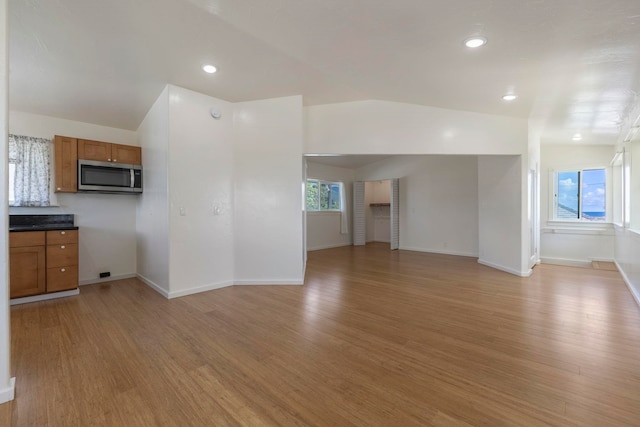 534 Kaikoo Pl, Wailuku, HI 96793 - unfurnished living room with light wood-type flooring, baseboards, and recessed lighting