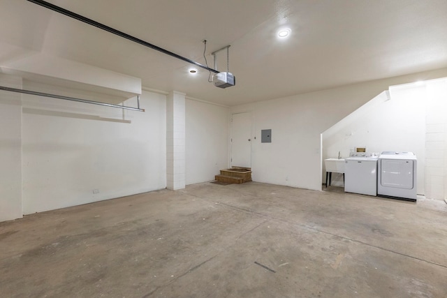 534 Kaikoo Pl, Wailuku, HI 96793 - garage with washing machine and dryer, electric panel, a sink, and a garage door opener