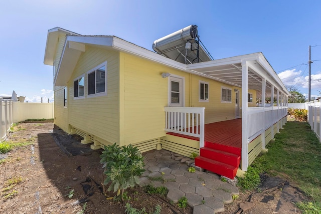 534 Kaikoo Pl, Wailuku, HI 96793 - view of side of home featuring a fenced backyard and a wooden deck