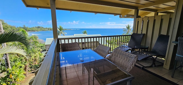 balcony featuring a water view