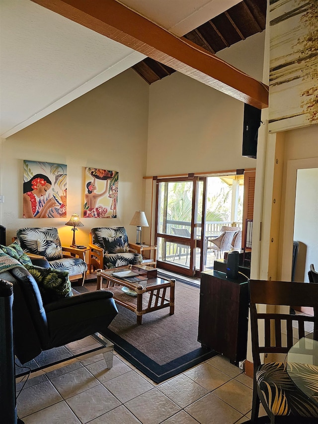 living room featuring light tile patterned flooring, beam ceiling, and high vaulted ceiling