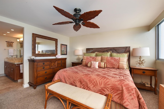 bedroom featuring multiple windows, light colored carpet, and ceiling fan