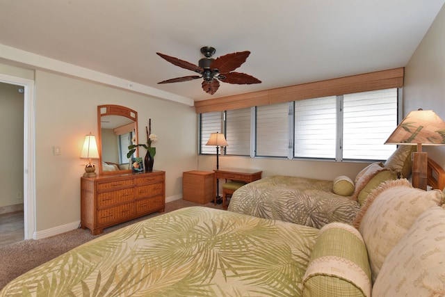 bedroom with ceiling fan and carpet