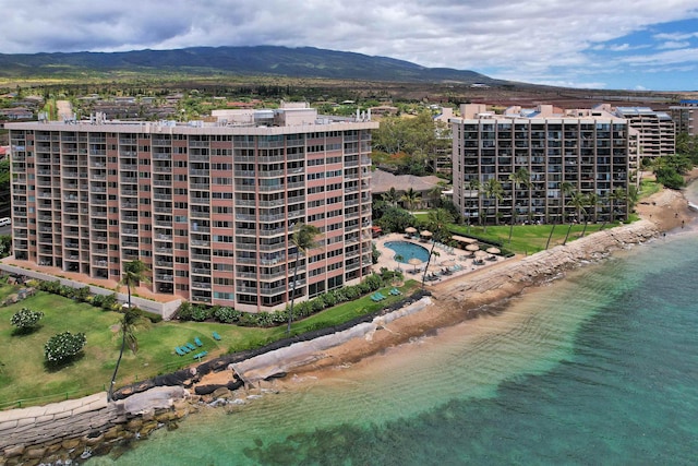 bird's eye view featuring a beach view and a water and mountain view