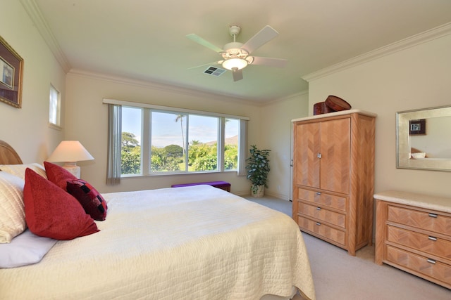 bedroom featuring light carpet, visible vents, ornamental molding, and a ceiling fan