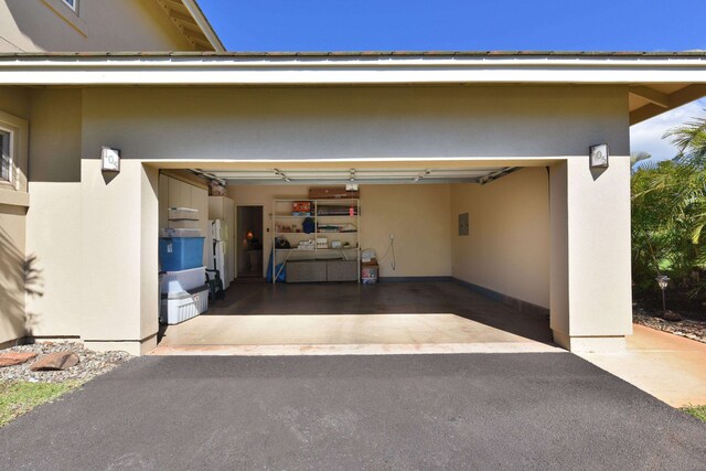 garage with driveway