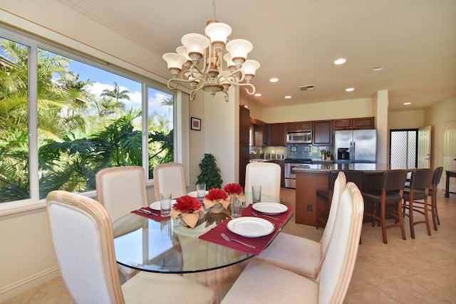 dining space with light tile patterned flooring, visible vents, a chandelier, and recessed lighting