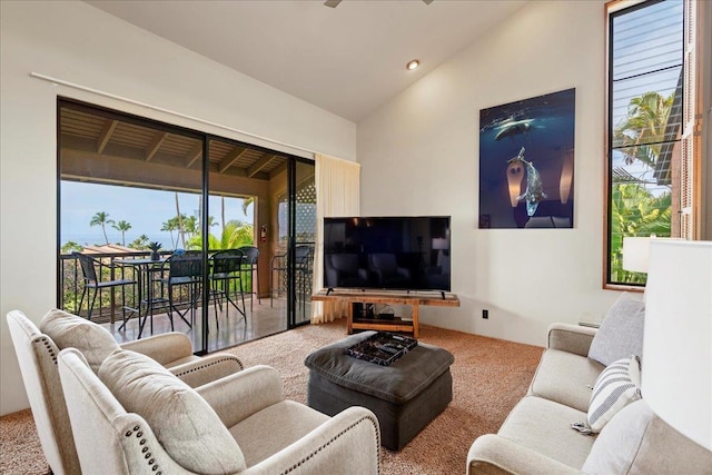 carpeted living room featuring recessed lighting, ceiling fan, and lofted ceiling