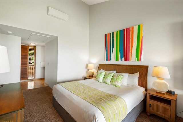 carpeted bedroom featuring attic access