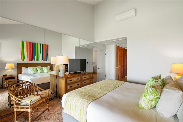 bedroom with carpet and a closet
