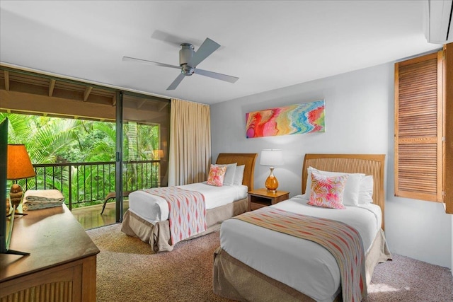 bedroom with access to outside, carpet flooring, a ceiling fan, and a wall mounted AC