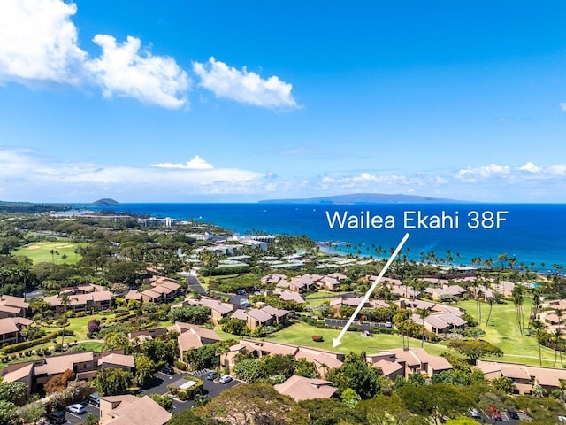 bird's eye view with a residential view and a water view