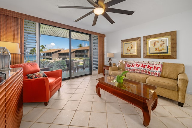 tiled living room with ceiling fan