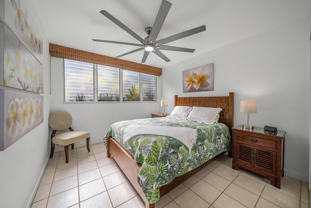 tiled bedroom with ceiling fan